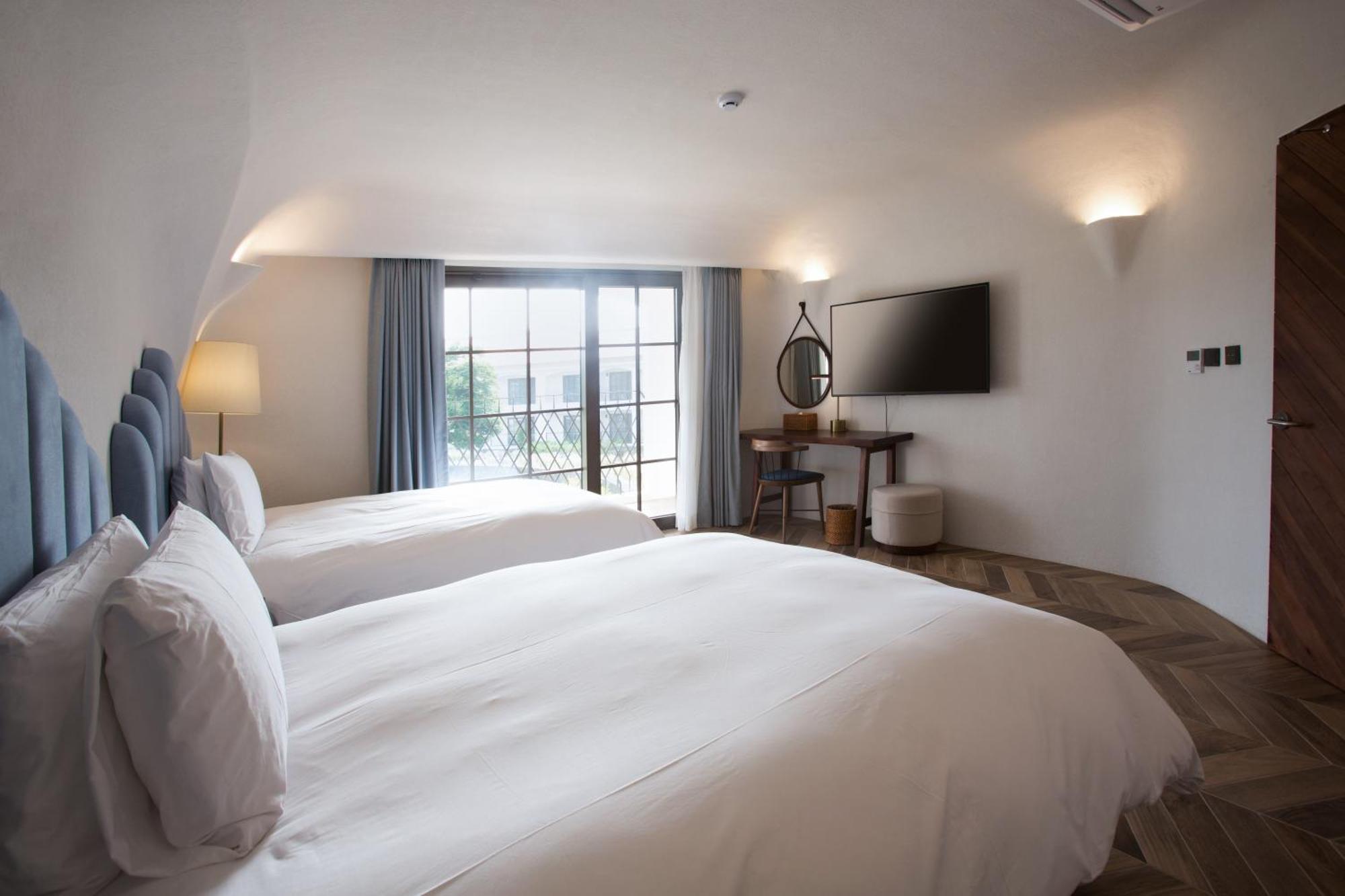 Ecoland Hotel Jeju Exterior photo