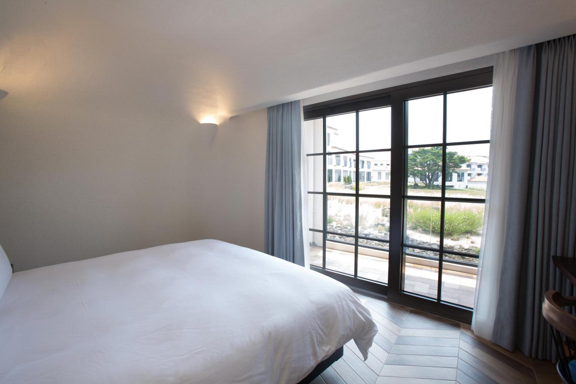 Ecoland Hotel Jeju Exterior photo