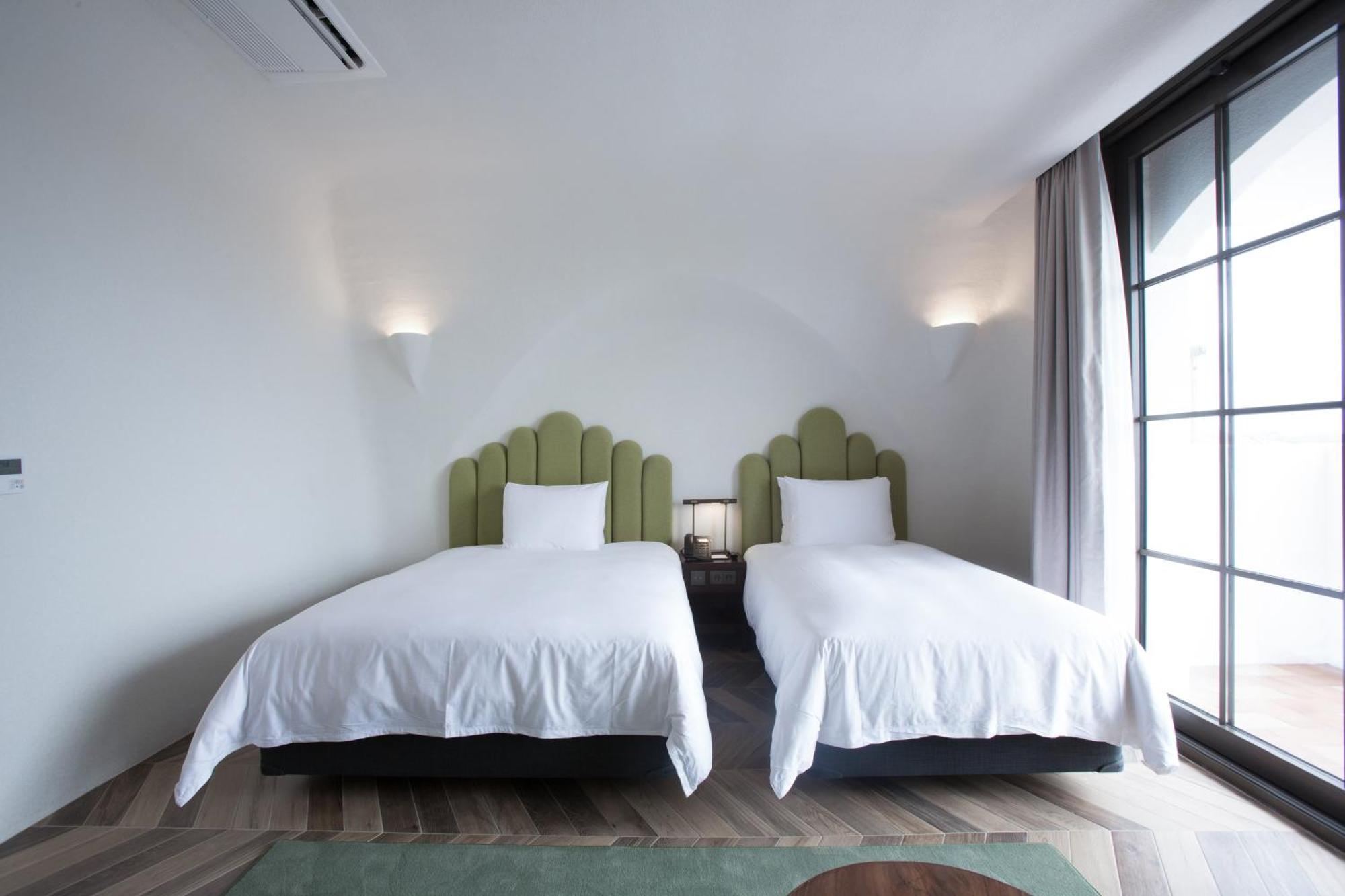 Ecoland Hotel Jeju Exterior photo