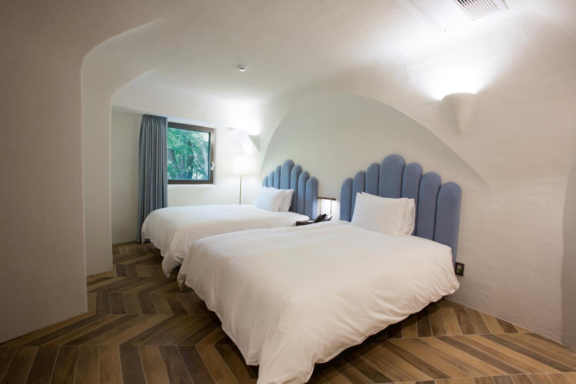 Ecoland Hotel Jeju Exterior photo